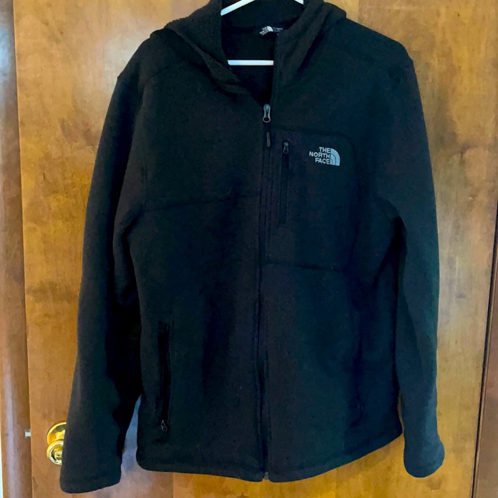 The North Face dark gray zip up hoodie.